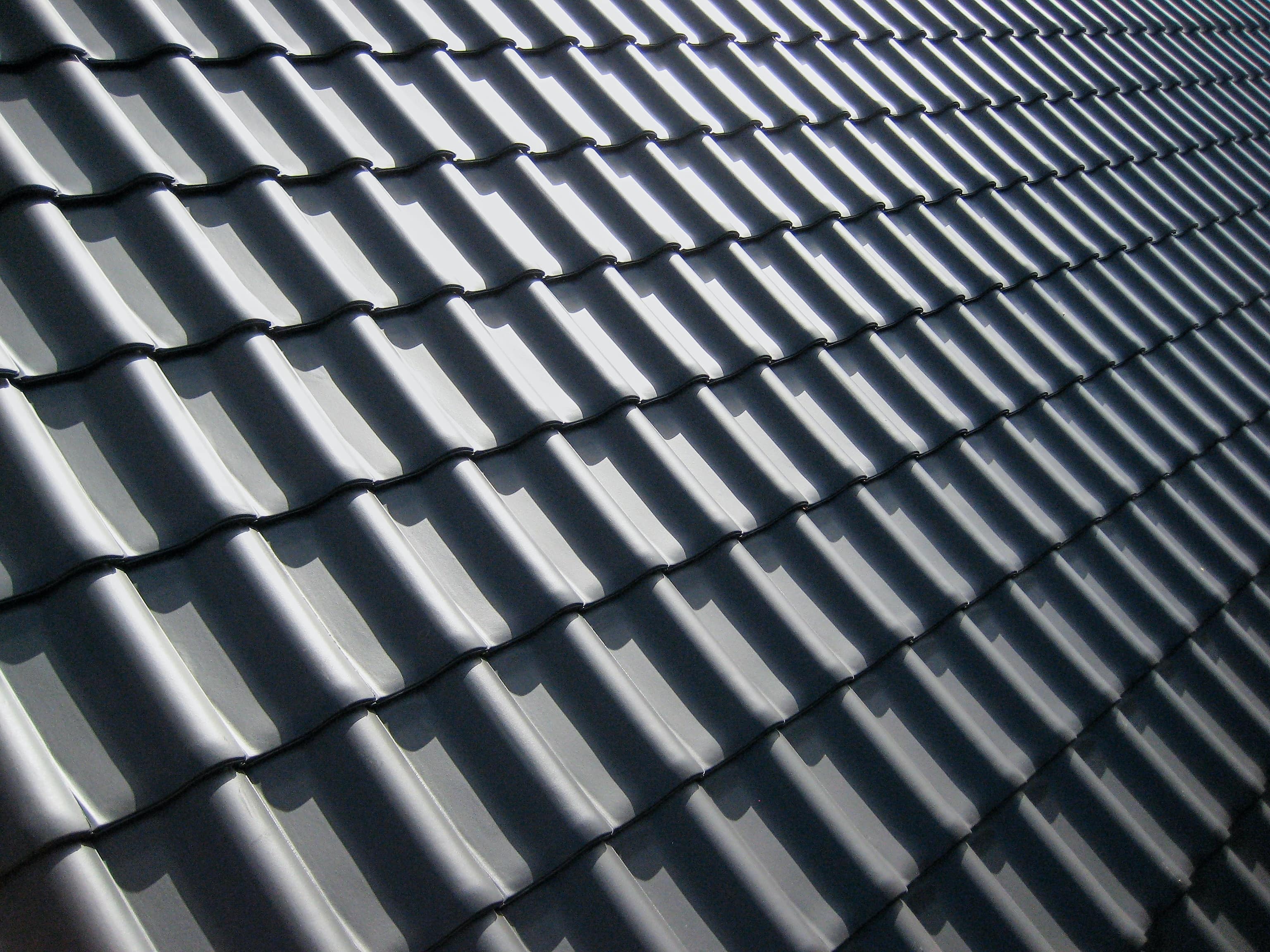Close up of gray tile roof. 