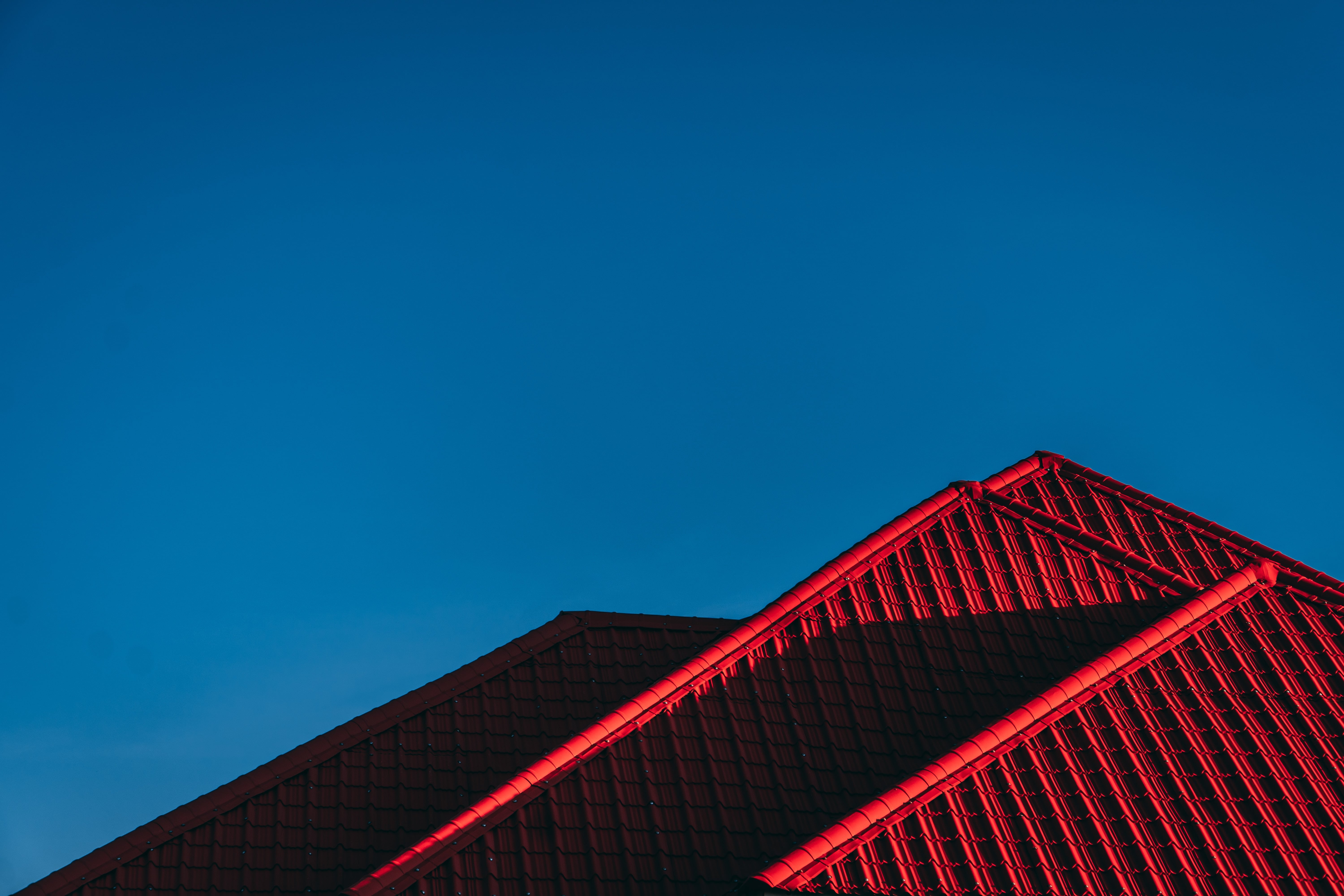 Close up photo of red roof. 
